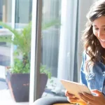 Adult student studying online while balancing work and family